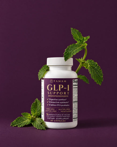 TAMAM GLP-1 Support bottle with fresh mint on plum